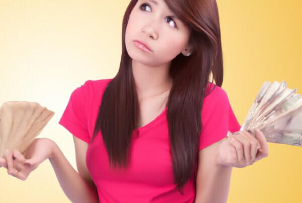 Young sober woman concerned about money and feelings