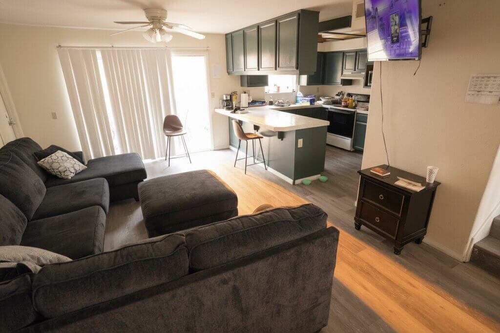A bright and tidy common area in a sober living home, illustrating a safe and supportive environment for addiction recovery.