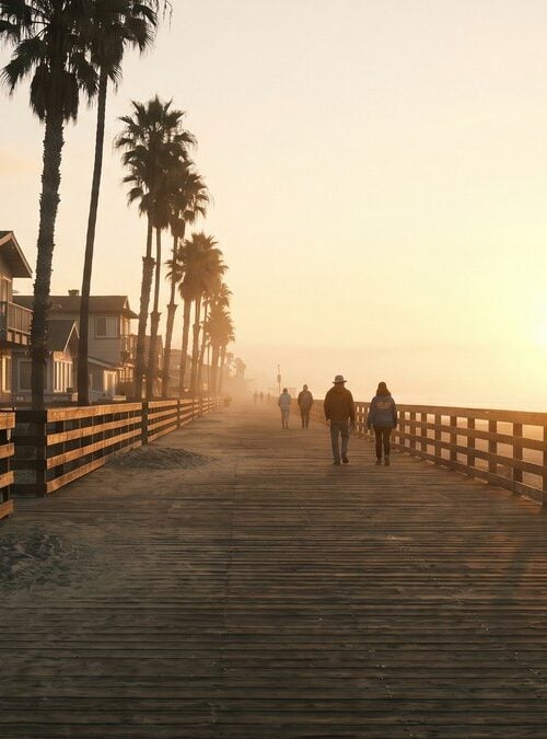 Long Pacific Beach boardwalk at sunrise showing the long road of a sober living stay